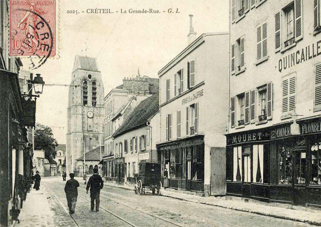 Photo de la grande rue et l'église saint christophe avant